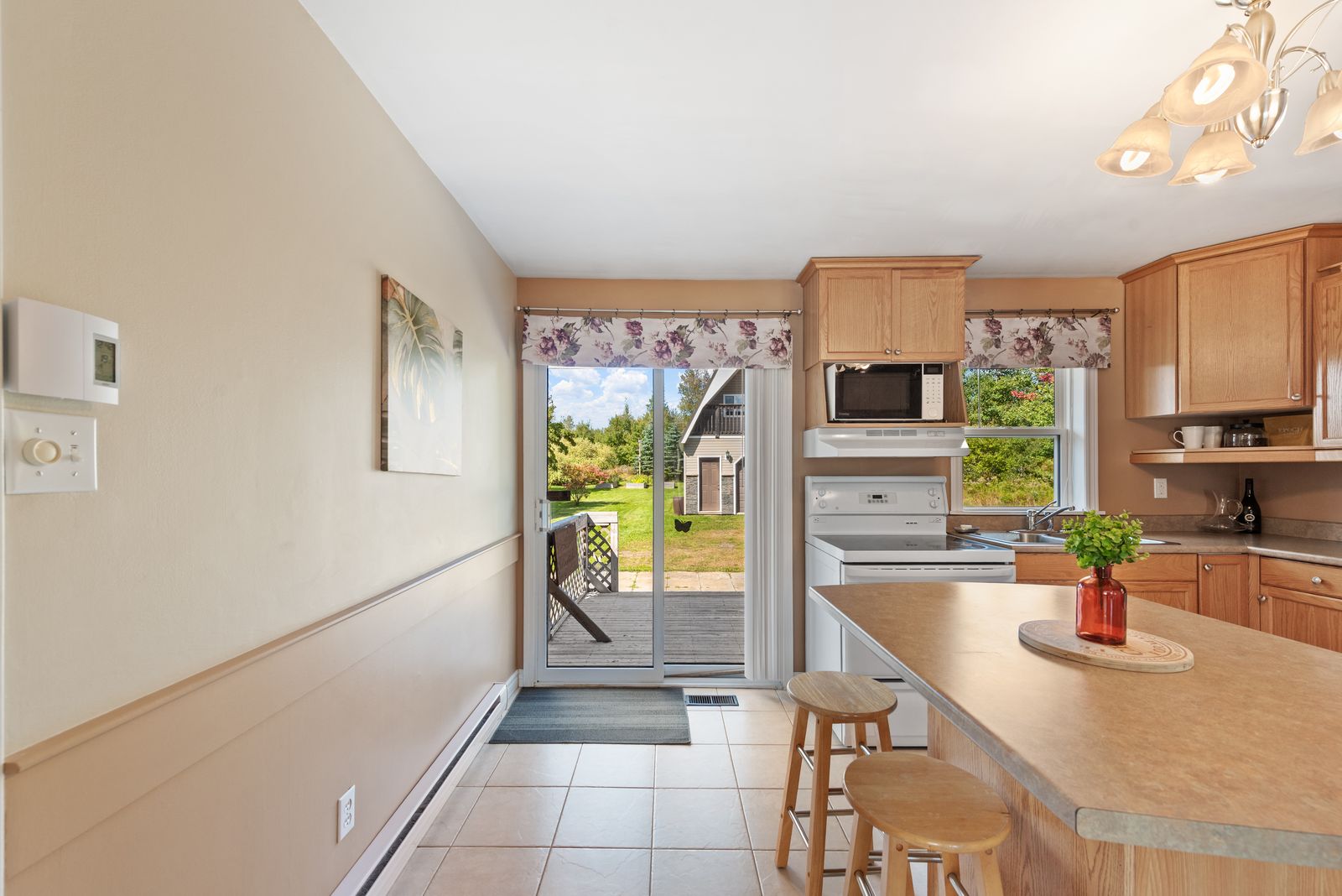 Kitchen opening onto the deck